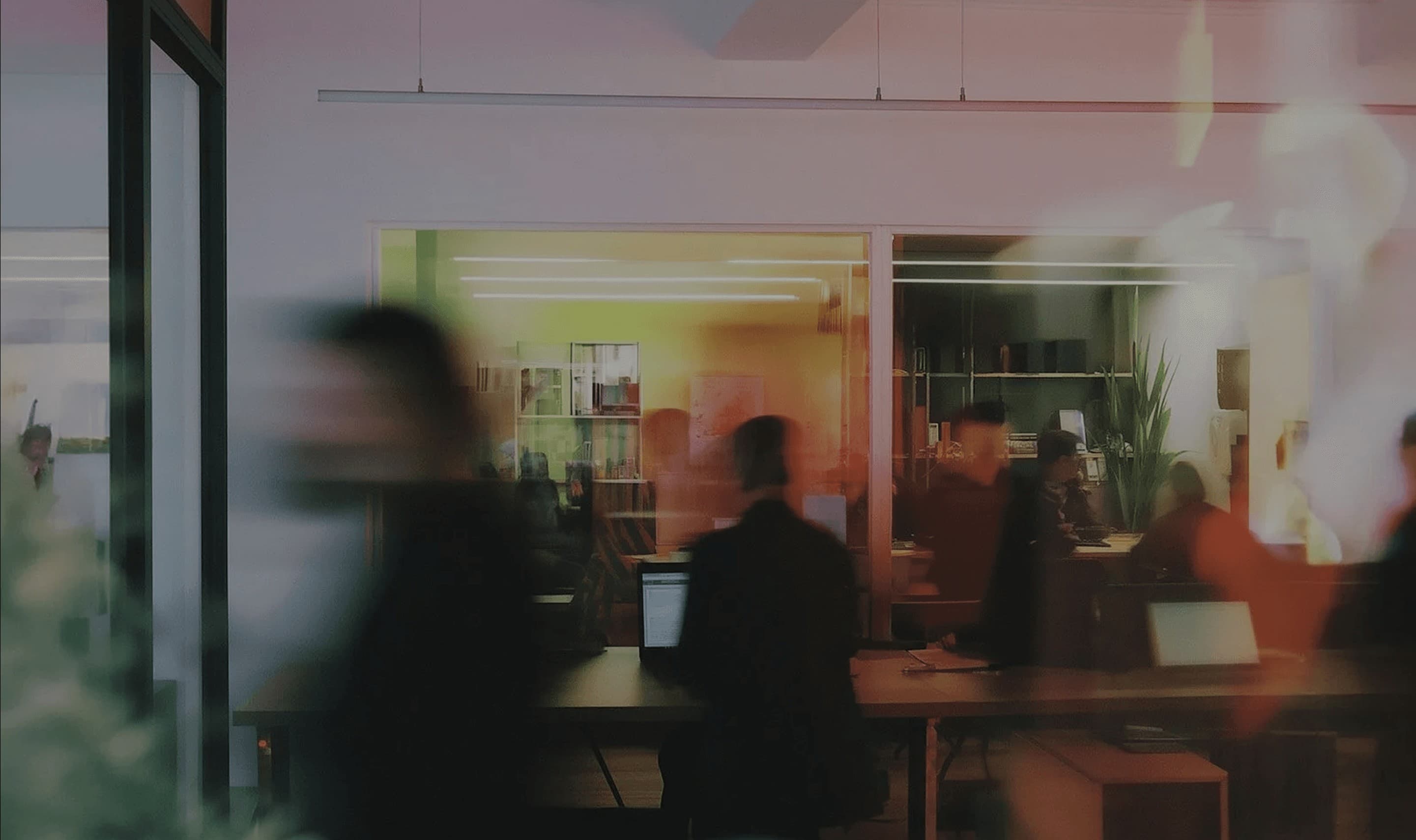 People collaborating in a shared workspace
